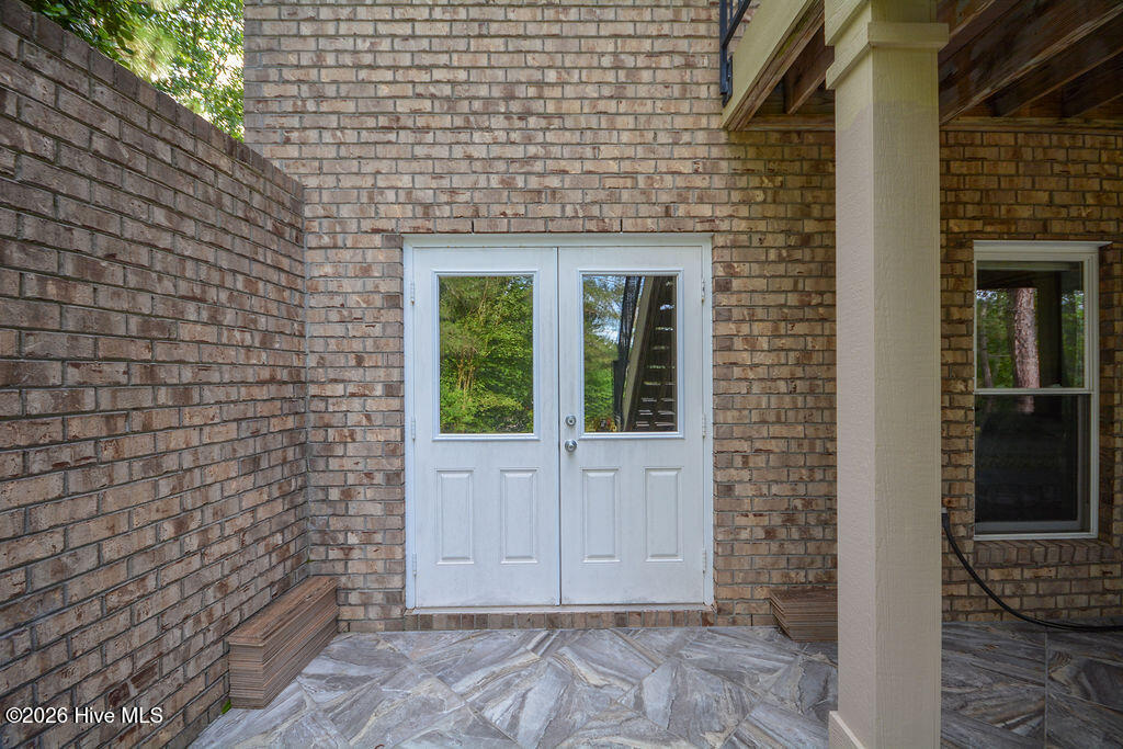 210 Beths Point West End, NC 27376 - Photo 110 of 174 Doors to Work Shop/Golf Cart Storage