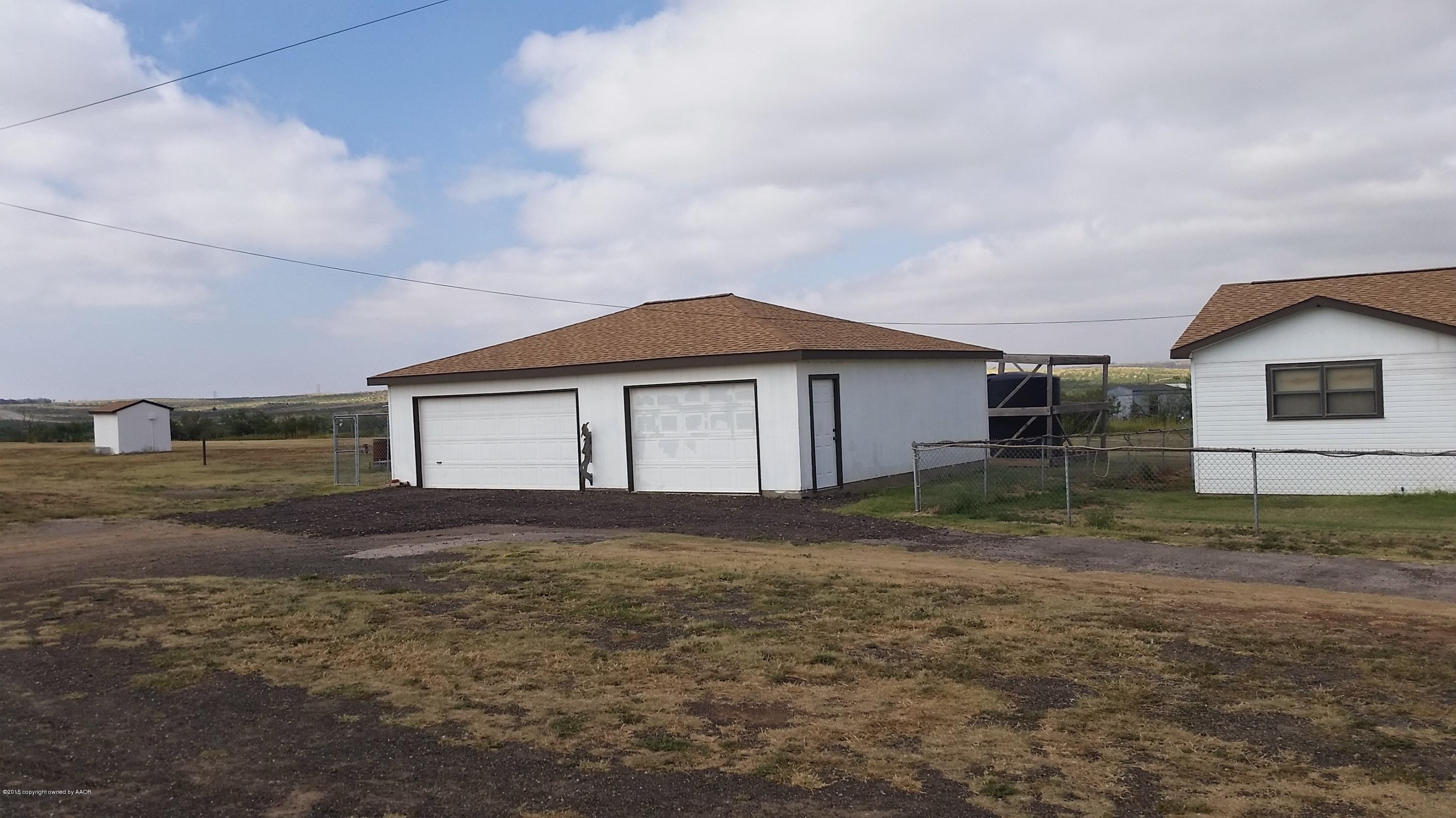 6371 Cliffside Road Amarillo, TX 79124 - Photo 2 of 14 2 car garage and shop.jpg