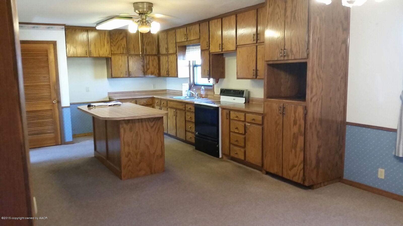 6371 Cliffside Road Amarillo, TX 79124 - Photo 10 of 14 Kitchen Dining Room Combo.jpeg