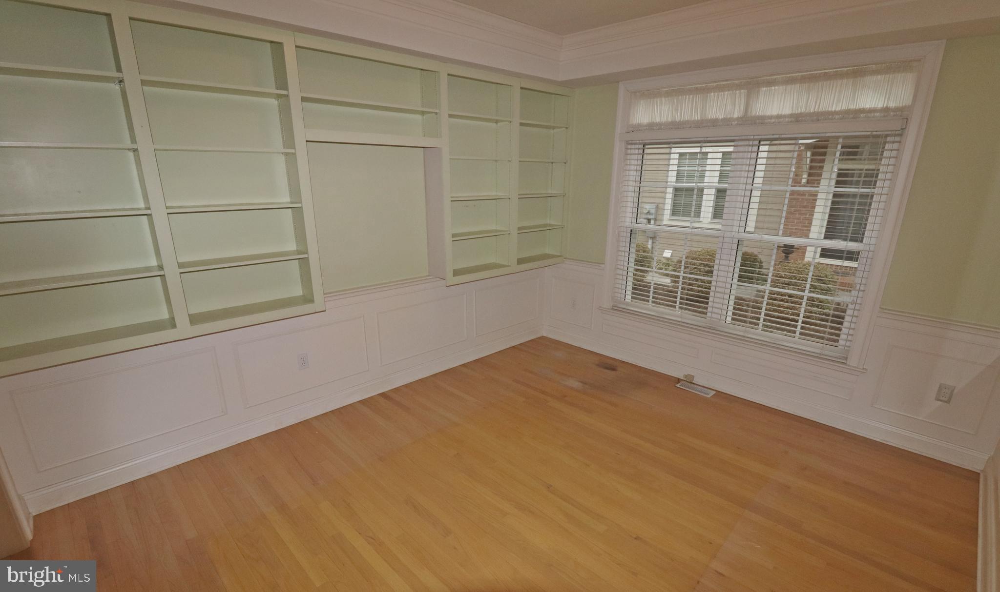 617 Northfield Road Lititz, PA 17543 - Photo 6 of 44 a view of empty room with wooden floor and cabinet