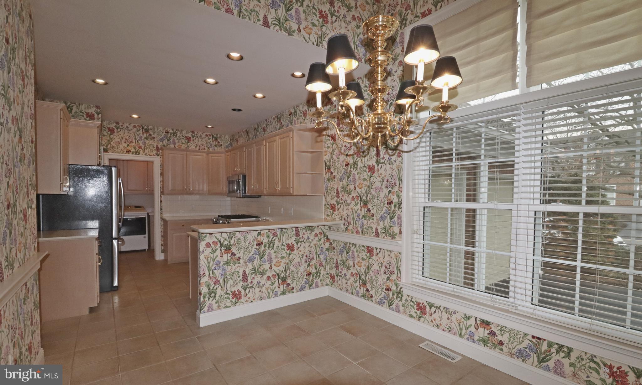 617 Northfield Road Lititz, PA 17543 - Photo 7 of 44 a view of a living room with a chandelier
