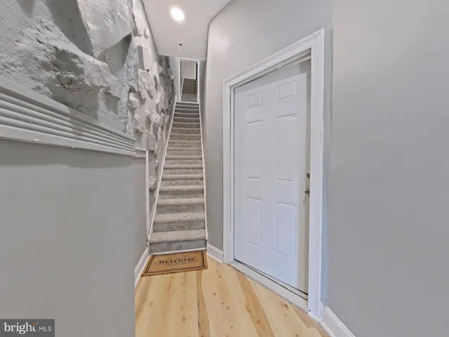 a view of entryway with stairs