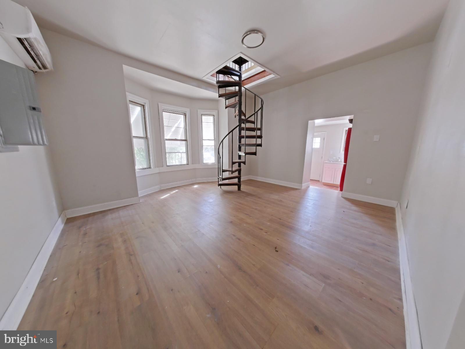5331 Wayne Avenue Philadelphia, PA 19144 - Photo 13 of 53 wooden floor in an empty room with a window