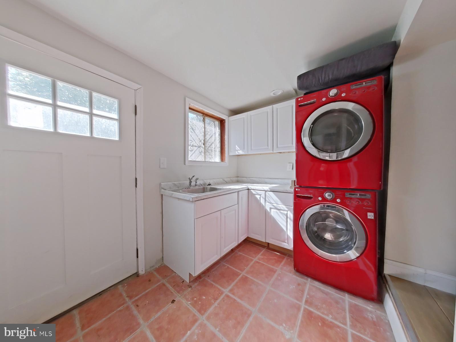 5331 Wayne Avenue Philadelphia, PA 19144 - Photo 15 of 53 a utility room with dryer and washer