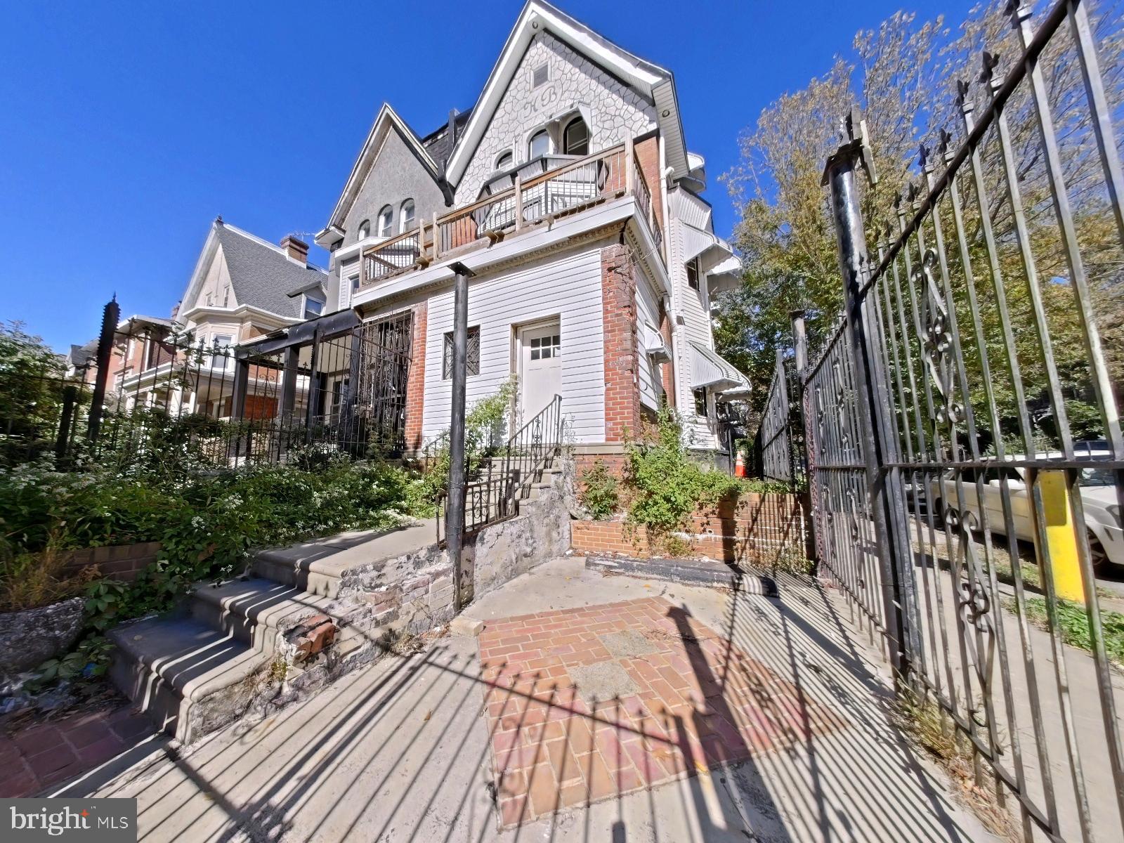 5331 Wayne Avenue Philadelphia, PA 19144 - Photo 17 of 53 a front view of a house with a garden
