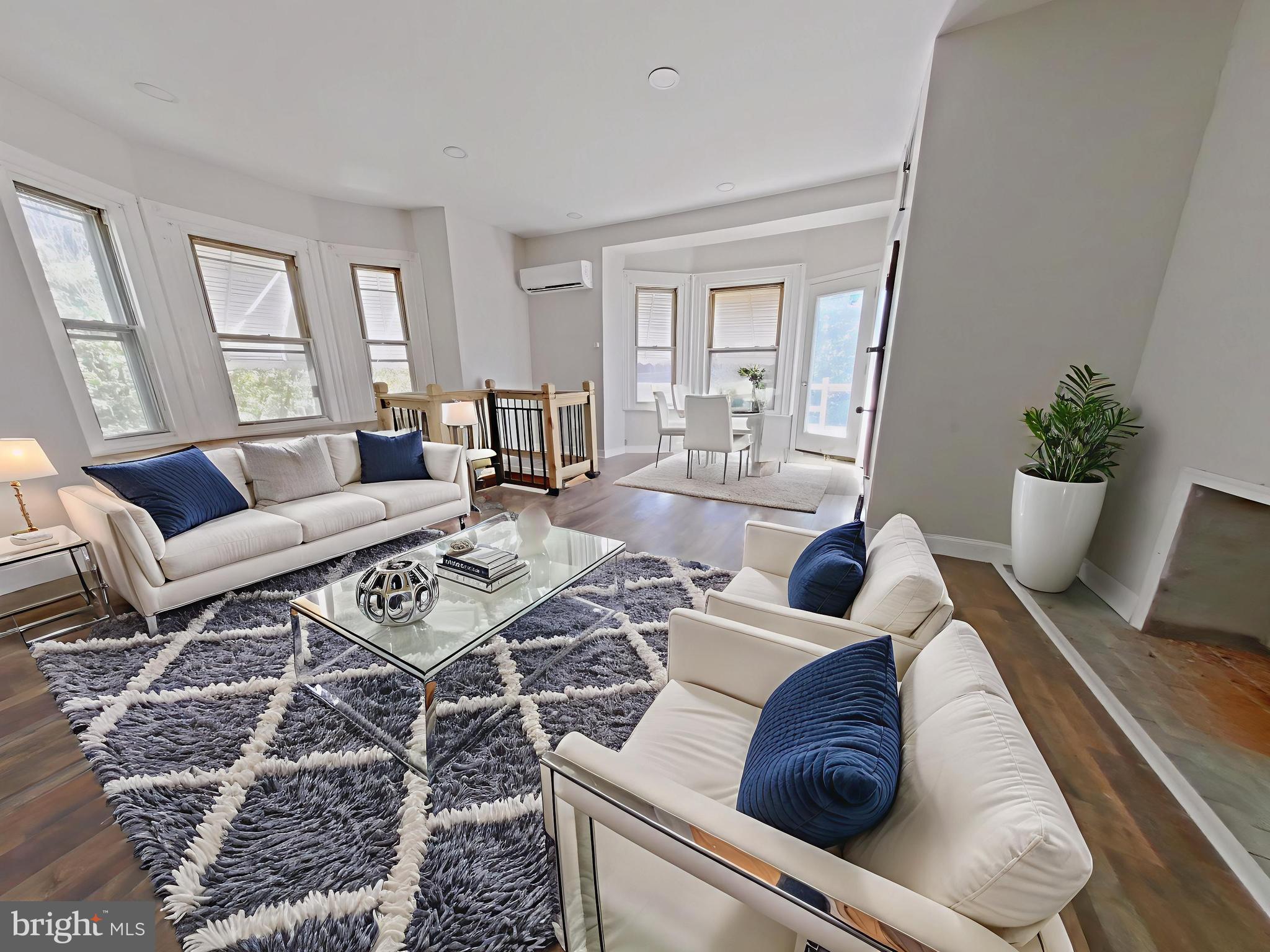 5331 Wayne Avenue Philadelphia, PA 19144 - Photo 2 of 53 a living room with furniture and wooden floor