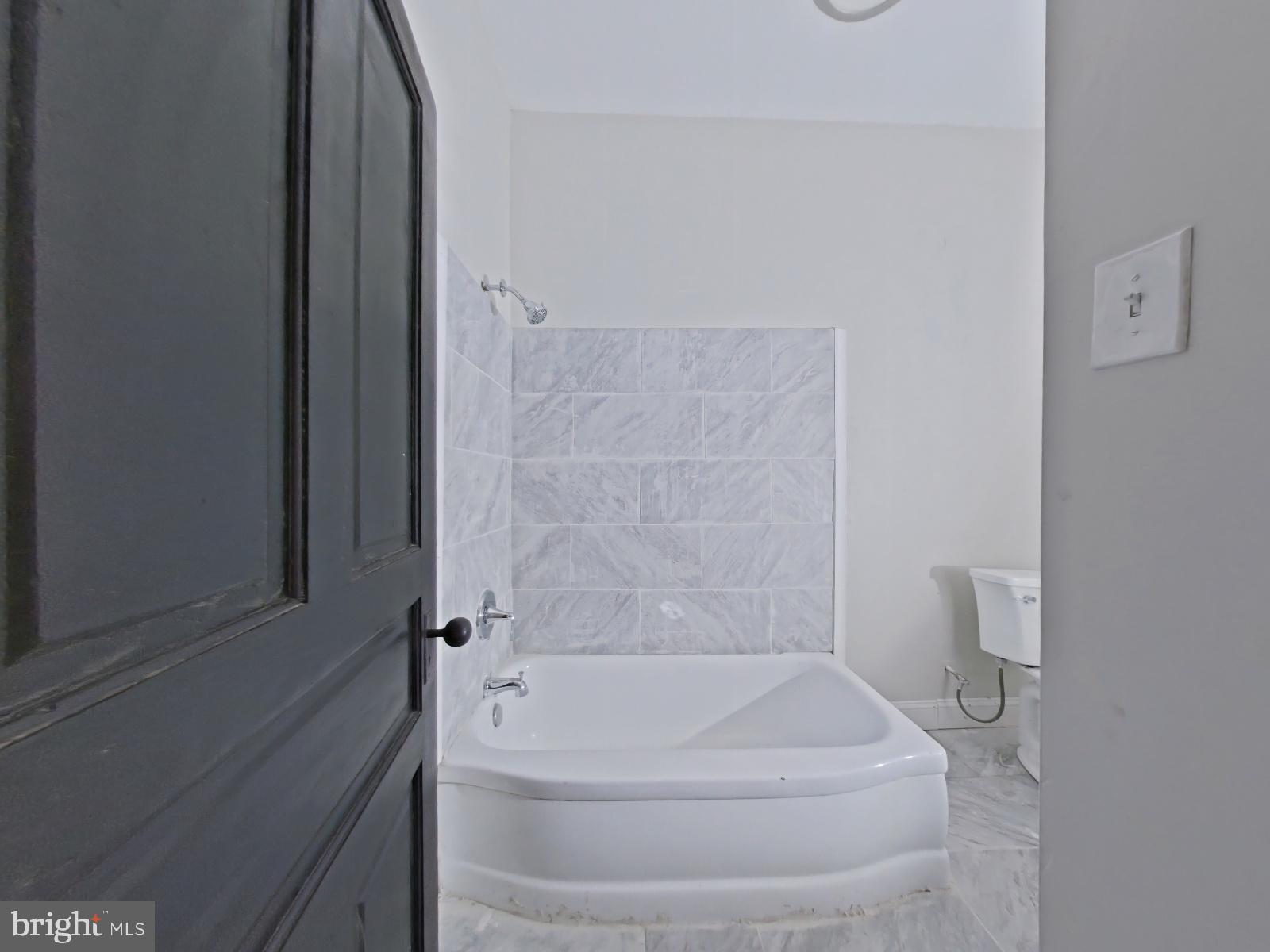5331 Wayne Avenue Philadelphia, PA 19144 - Photo 22 of 53 a bathroom with a bathtub