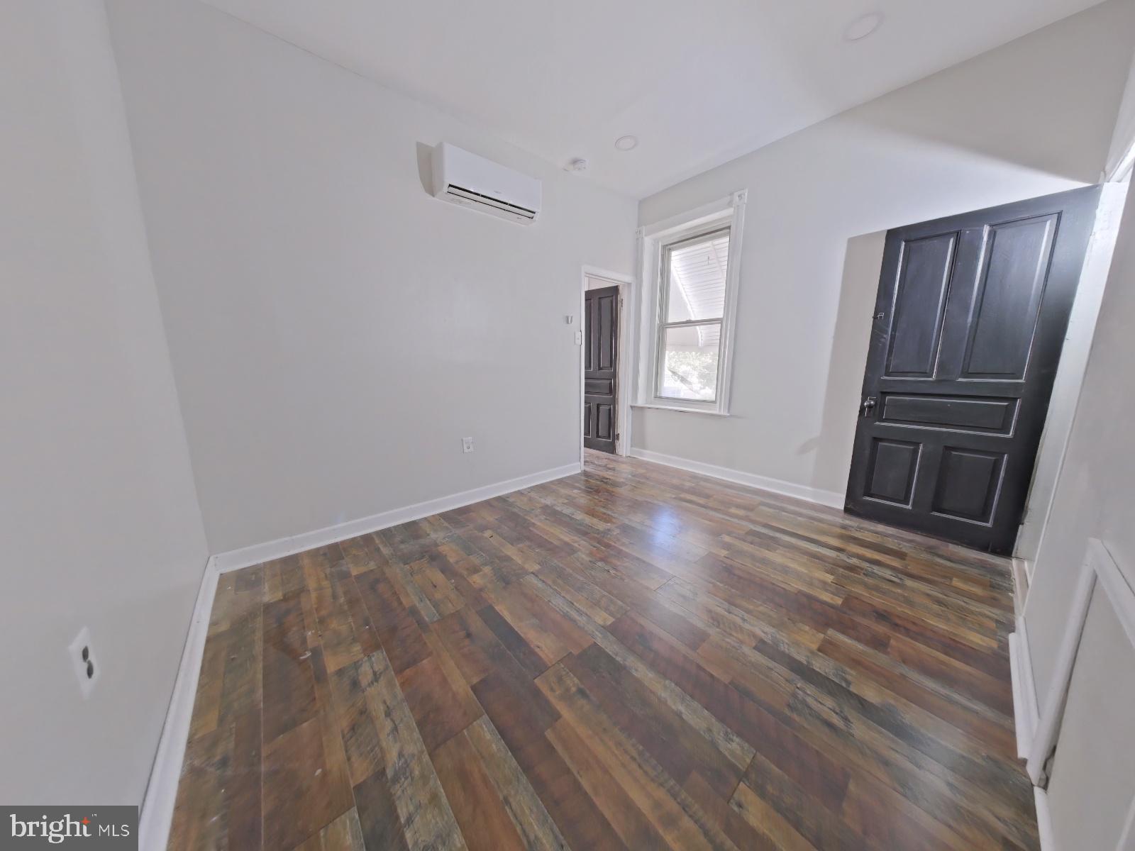 5331 Wayne Avenue Philadelphia, PA 19144 - Photo 30 of 53 wooden floor in an empty room with a window