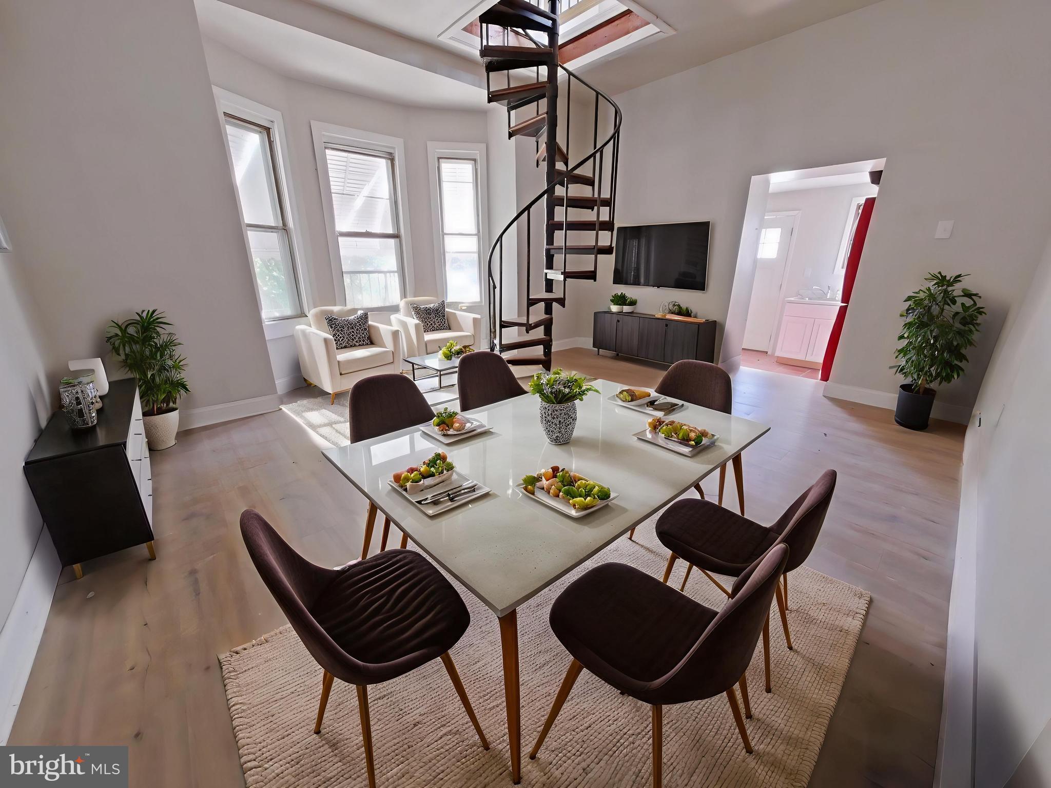 5331 Wayne Avenue Philadelphia, PA 19144 - Photo 3 of 53 a view of a dining room with furniture and wooden floor
