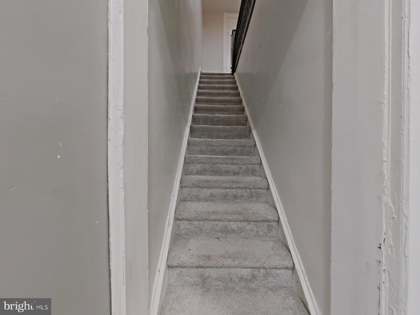 5331 Wayne Avenue Philadelphia, PA 19144 - Photo 34 of 53 a view of staircase with white walls and white door