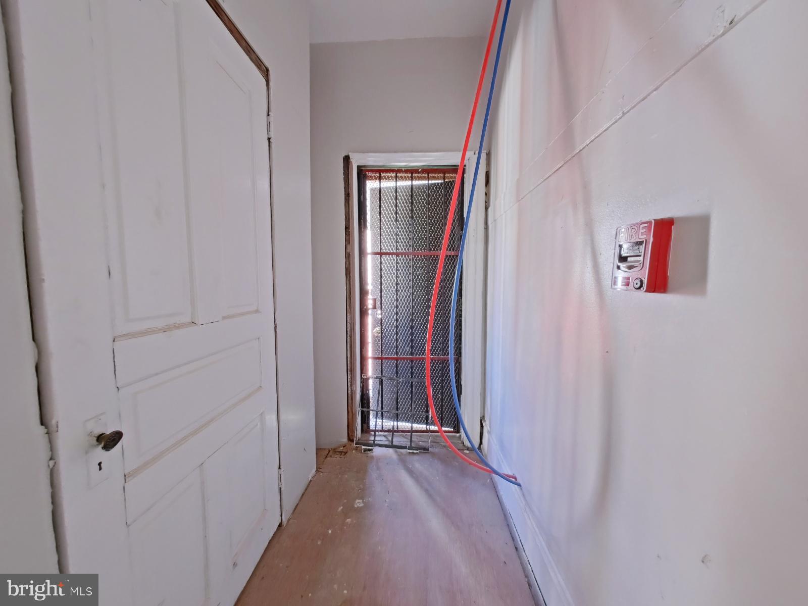 5331 Wayne Avenue Philadelphia, PA 19144 - Photo 36 of 53 a view of a hallway with wooden floor