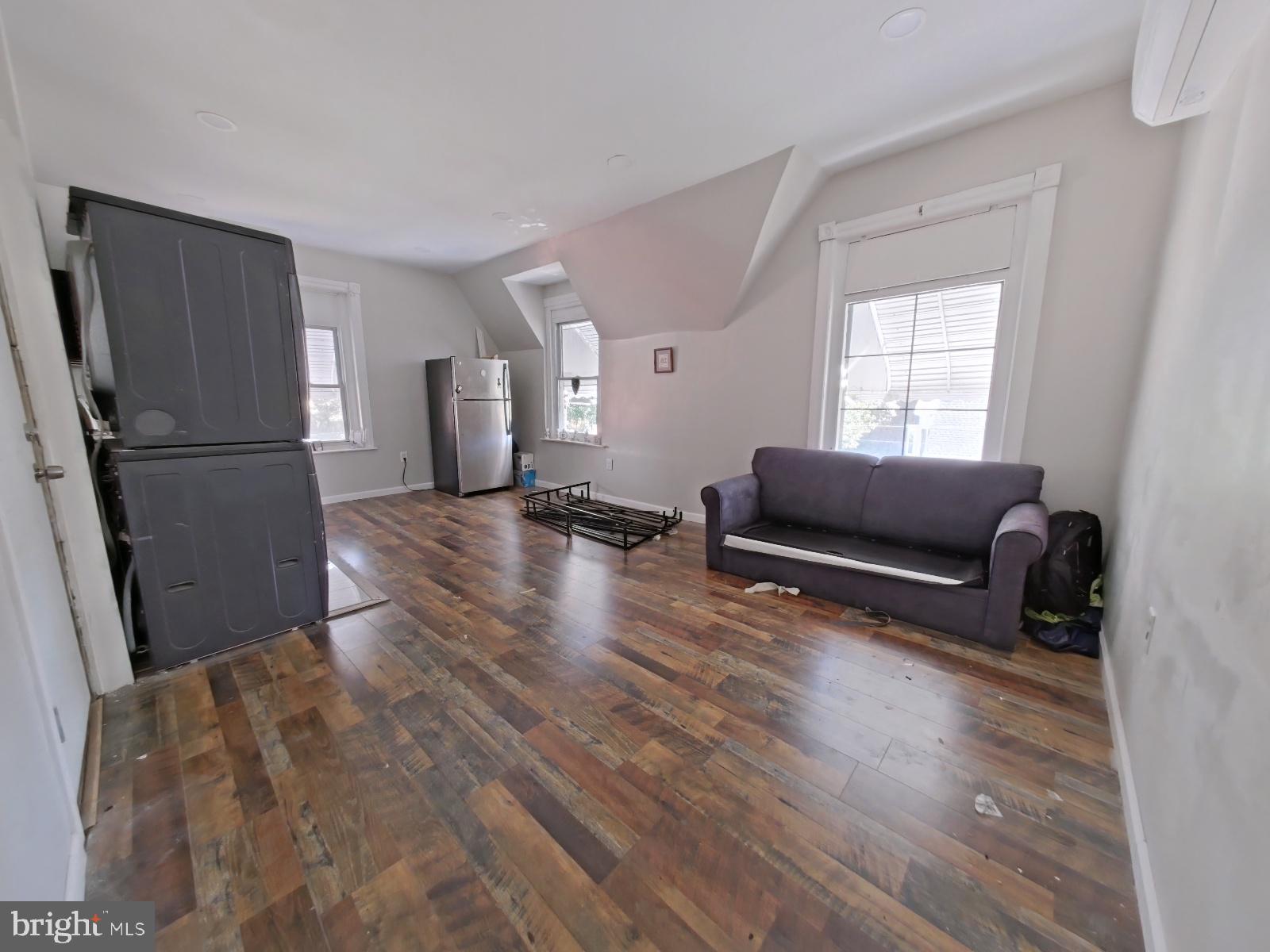5331 Wayne Avenue Philadelphia, PA 19144 - Photo 39 of 53 a living room with furniture window and a wooden floor