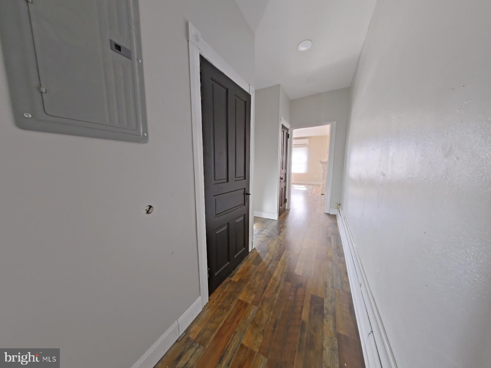5331 Wayne Avenue Philadelphia, PA 19144 - Photo 45 of 53 a view of a hallway with wooden floor