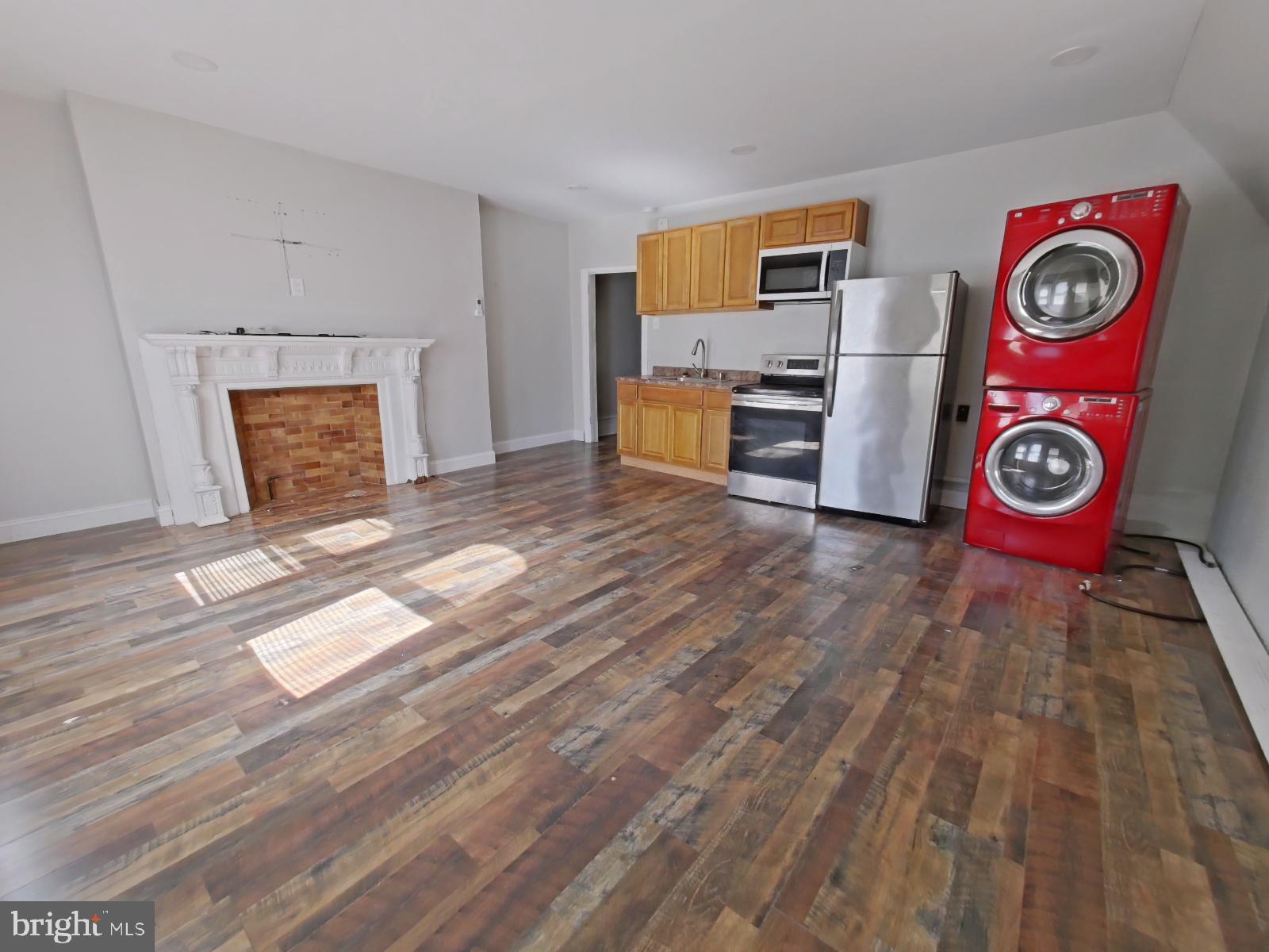 5331 Wayne Avenue Philadelphia, PA 19144 - Photo 49 of 53 a view of a hallway with wooden floor