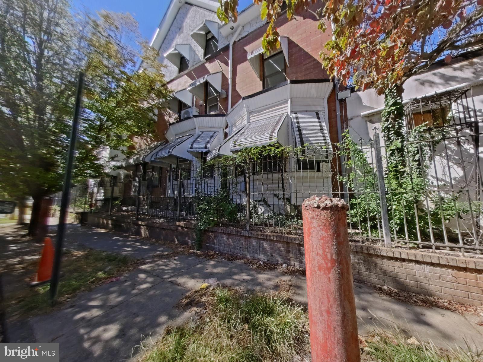 5331 Wayne Avenue Philadelphia, PA 19144 - Photo 52 of 53 a front view of a house with a yard