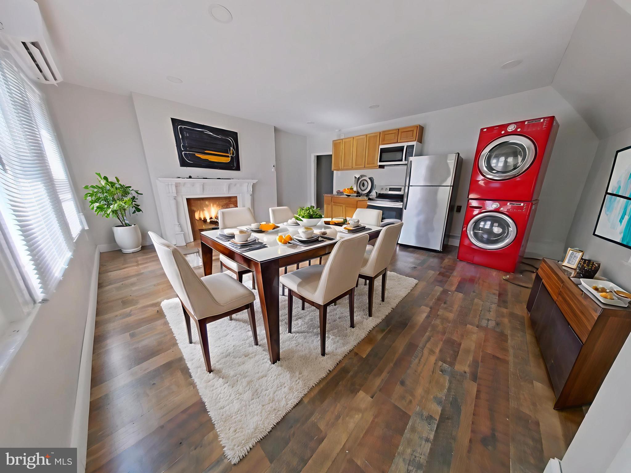 5331 Wayne Avenue Philadelphia, PA 19144 - Photo 8 of 53 a view of a dining room with furniture window and wooden floor
