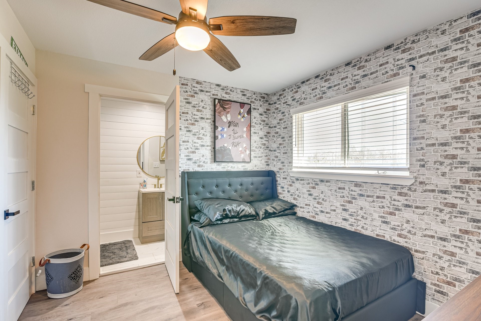 7003 McCoy Road Manvel, TX 77578 - Photo 18 of 27 a view of dining room and wooden floor