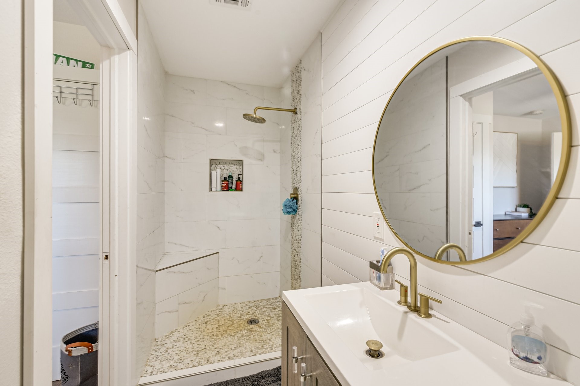 7003 McCoy Road Manvel, TX 77578 - Photo 21 of 27 a bathroom with a sink and a mirror