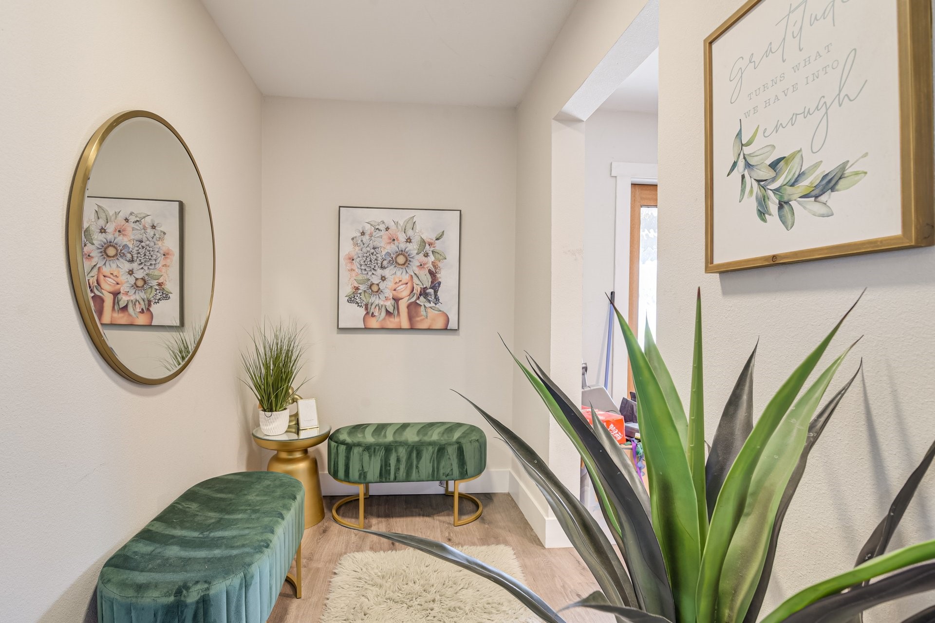 7003 McCoy Road Manvel, TX 77578 - Photo 22 of 27 a view of a hallway with paintings on the wall