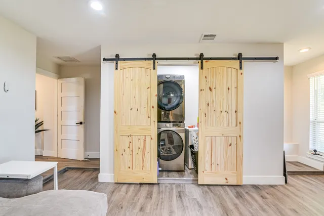 a view of a kitchen with washer and dryer