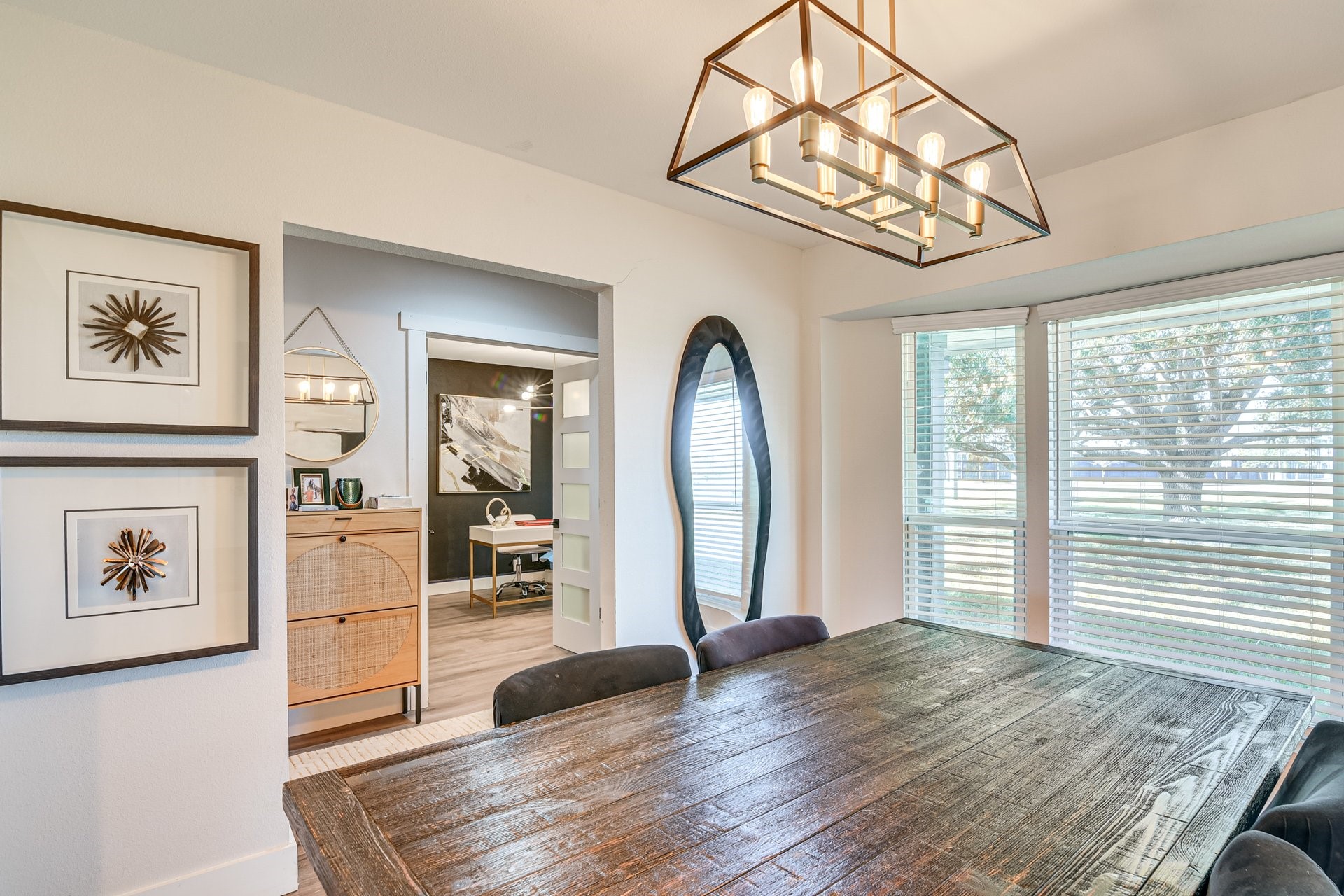 7003 McCoy Road Manvel, TX 77578 - Photo 7 of 27 a view of a livingroom with wooden floor and a large window