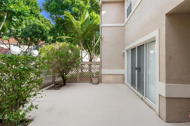 a view of an empty room with stairs