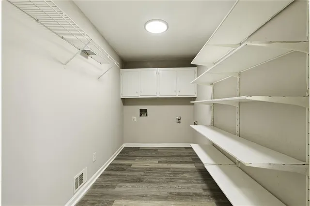 a view of a hallway with closet