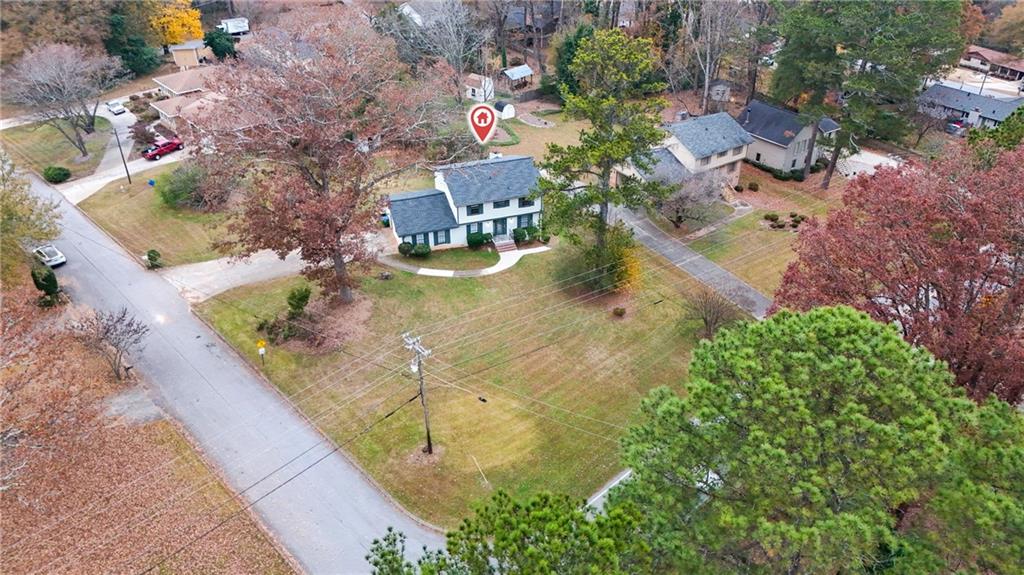 127 Old Rosser Road Lilburn, GA 30047 - Photo 27 of 34 an aerial view of residential houses with outdoor space