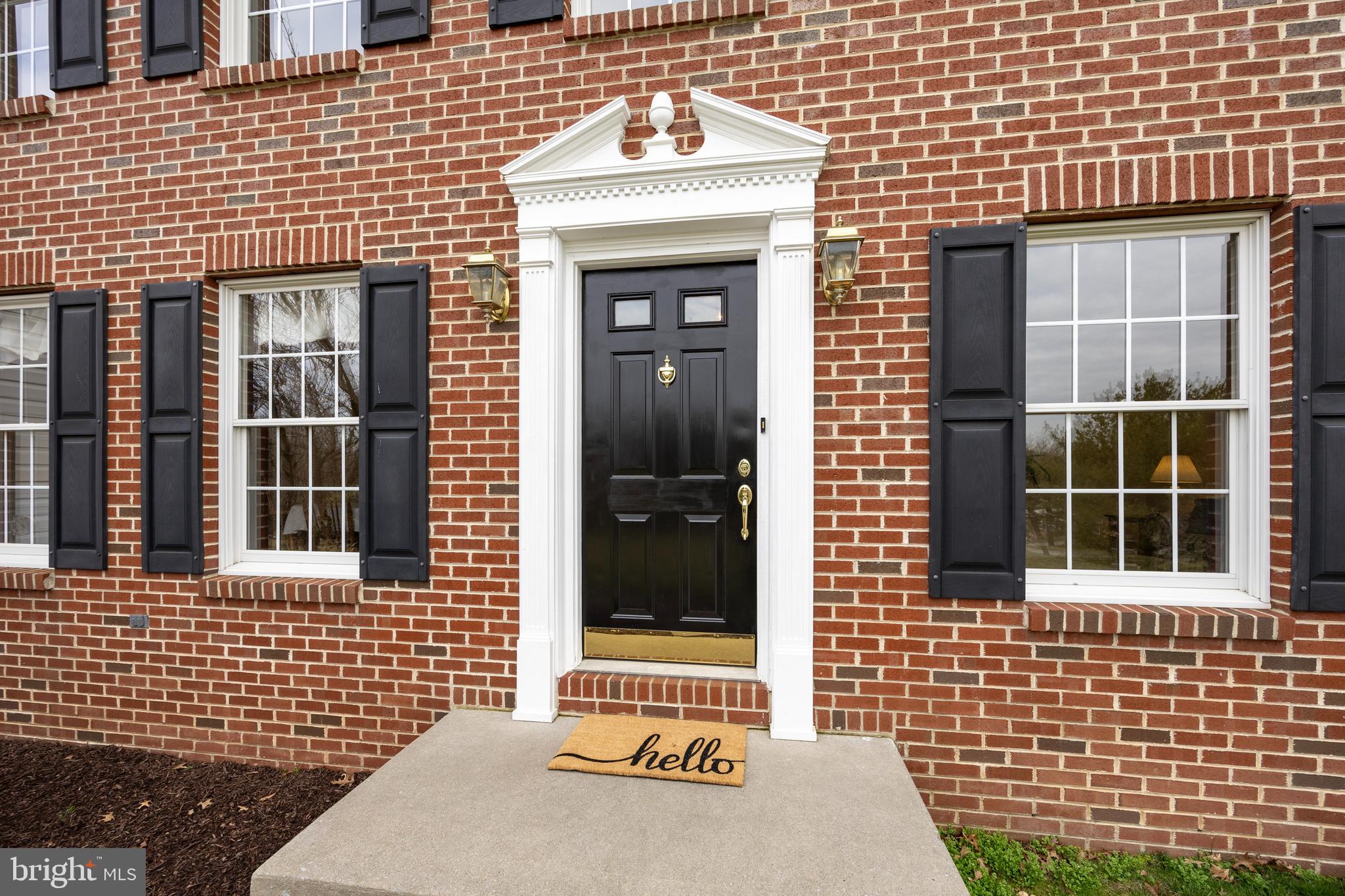 210 Stony Run Road Spring City, PA 19475 - Photo 3 of 42 a view of a brick house with a door
