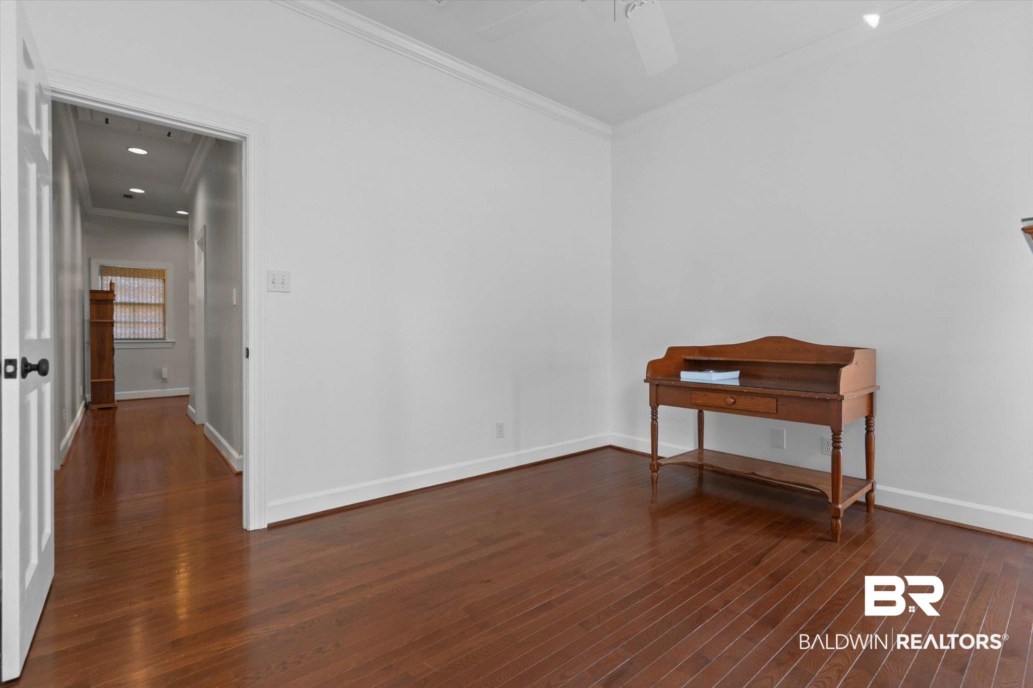 3615 Stein Street Mobile, AL 36608 - Photo 25 of 44 Spare room with crown molding, dark wood-style floors, and recessed lighting