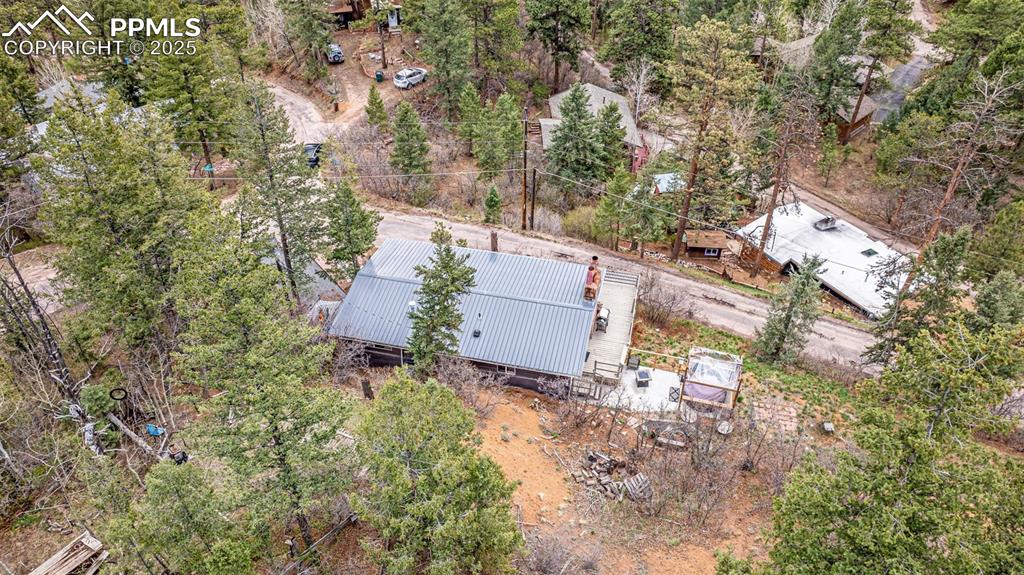9515 Mountain Road Cascade, CO 80809 - Photo 5 of 34 an aerial view of residential house with outdoor space