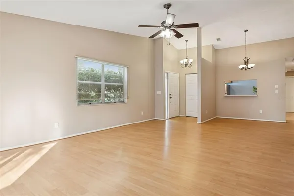 a view of an empty room with a window