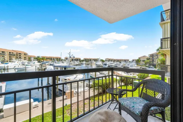 a view of a balcony with furniture