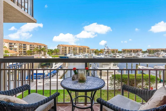 an aerial view of a house with a ocean view