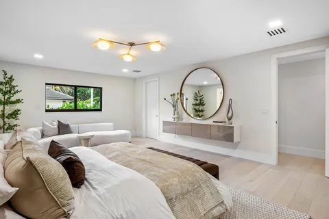 a bathroom with a double vanity sink mirror and double