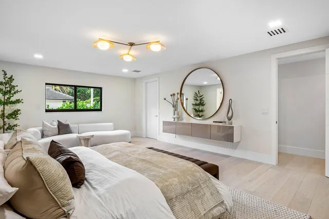 a bathroom with a double vanity sink mirror and double