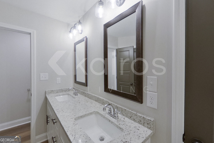 154 Allentown Way Macon, GA 31216 - Photo 16 of 21 a bathroom with a sink and a mirror