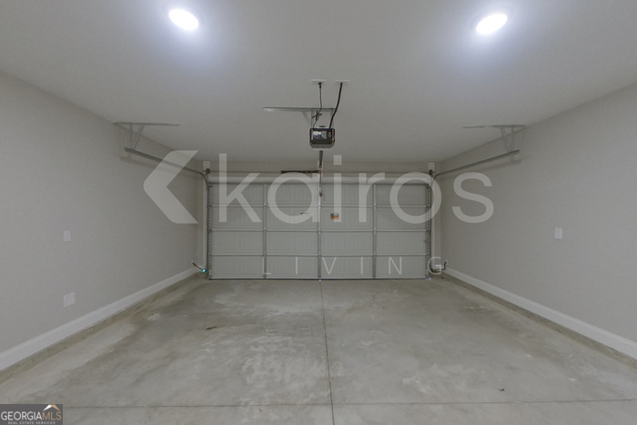 154 Allentown Way Macon, GA 31216 - Photo 18 of 21 a view of a room with racks on the wall