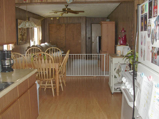 902 Woolf Court Rochelle, IL 61068 - Photo 4 of 6 a view of a dining room with furniture window and outside view