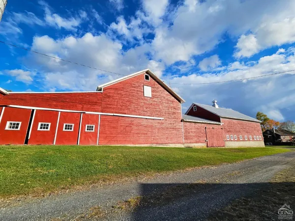 a view of a backyard with a house
