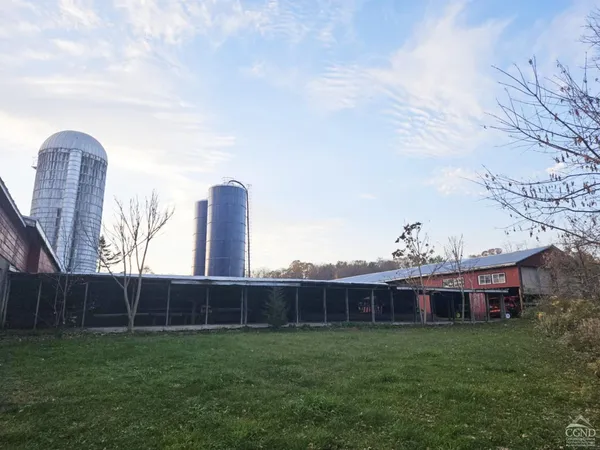 a view of a green field with clear sky