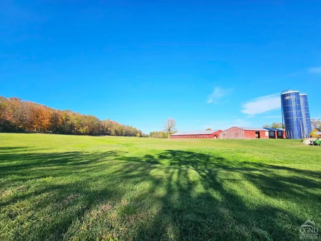 a view of a road with a yard