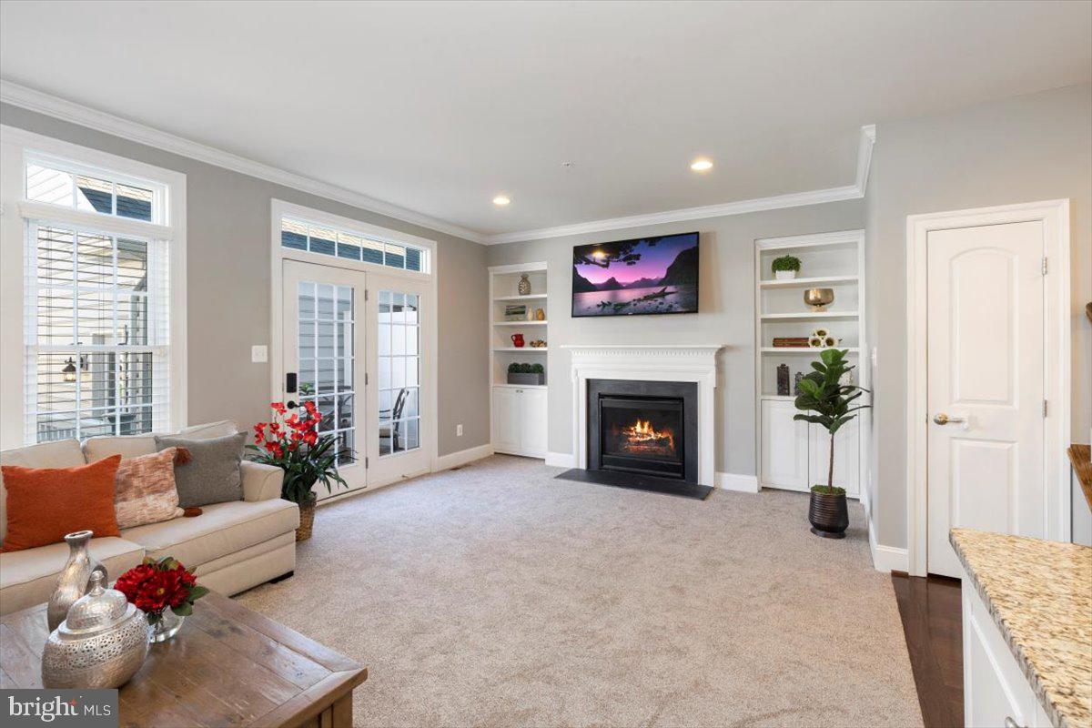 3802 Jacob Stout Road Doylestown, PA 18902 - Photo 11 of 36 Large living area with new carpet and fireplace
