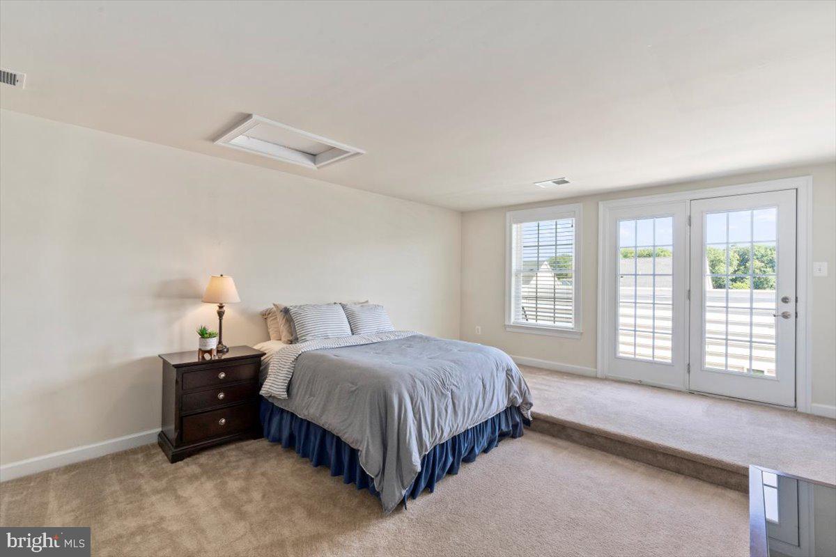 3802 Jacob Stout Road Doylestown, PA 18902 - Photo 25 of 36 3rd Floor bedroom with balcony and full bath
