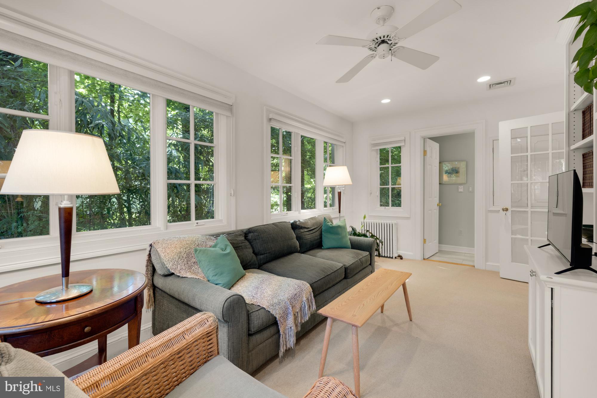3514 Shepherd Street Chevy Chase, MD 20815 - Photo 15 of 42 a living room with furniture and a flat screen tv