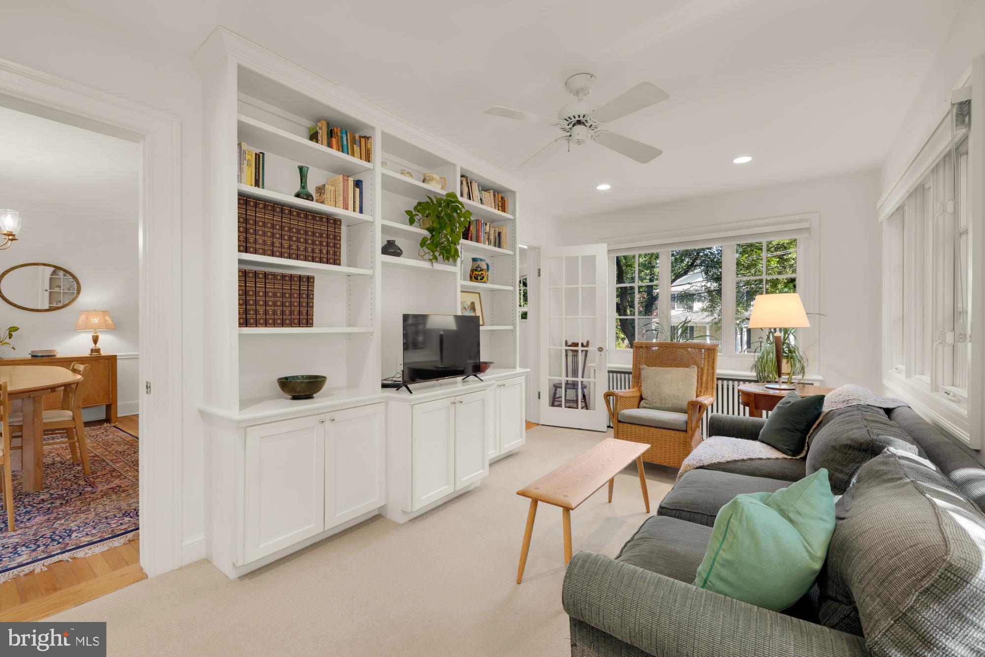 3514 Shepherd Street Chevy Chase, MD 20815 - Photo 16 of 42 a living room with furniture and a flat screen tv