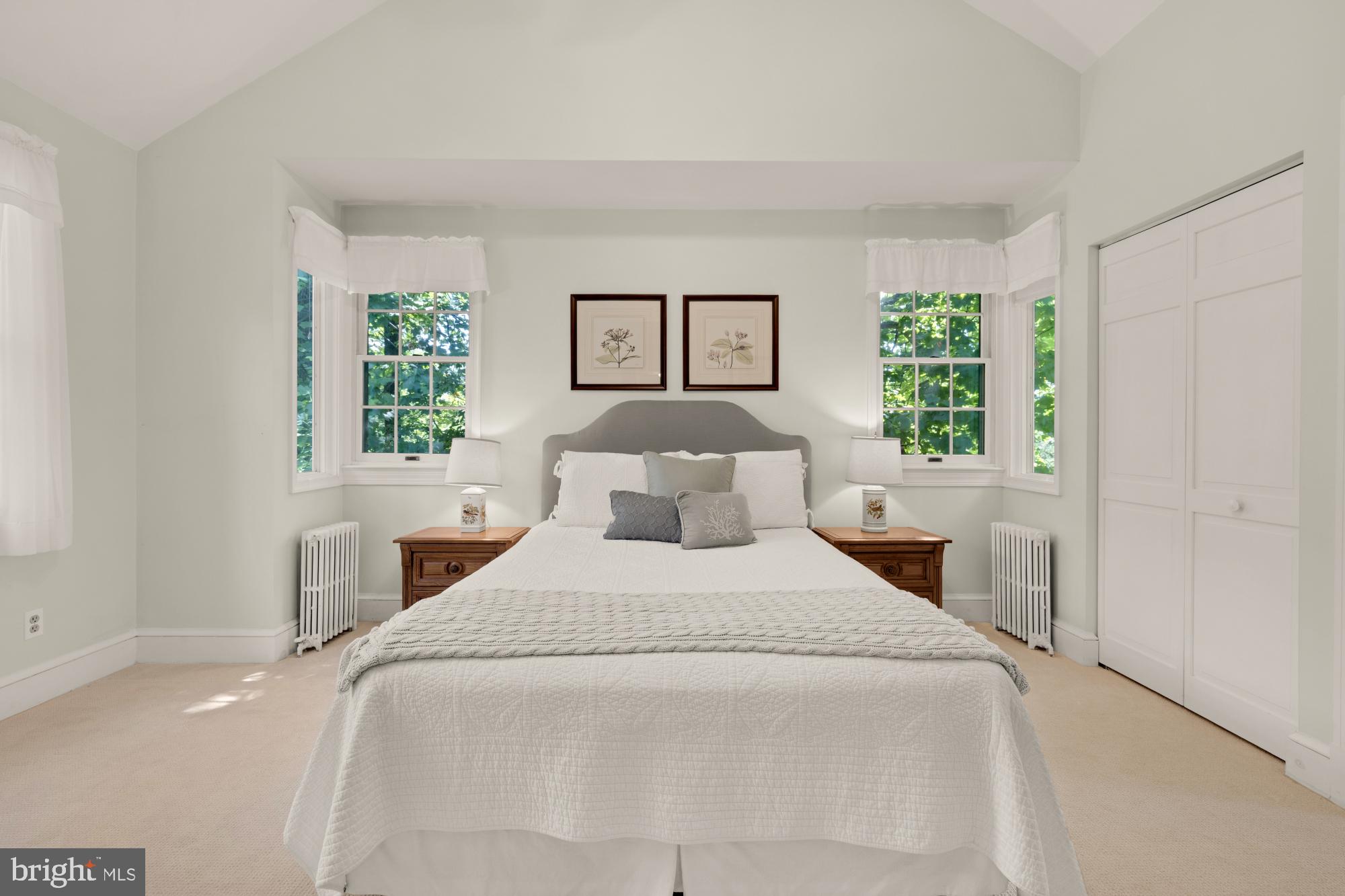 3514 Shepherd Street Chevy Chase, MD 20815 - Photo 19 of 42 a bedroom with a large bed and a window