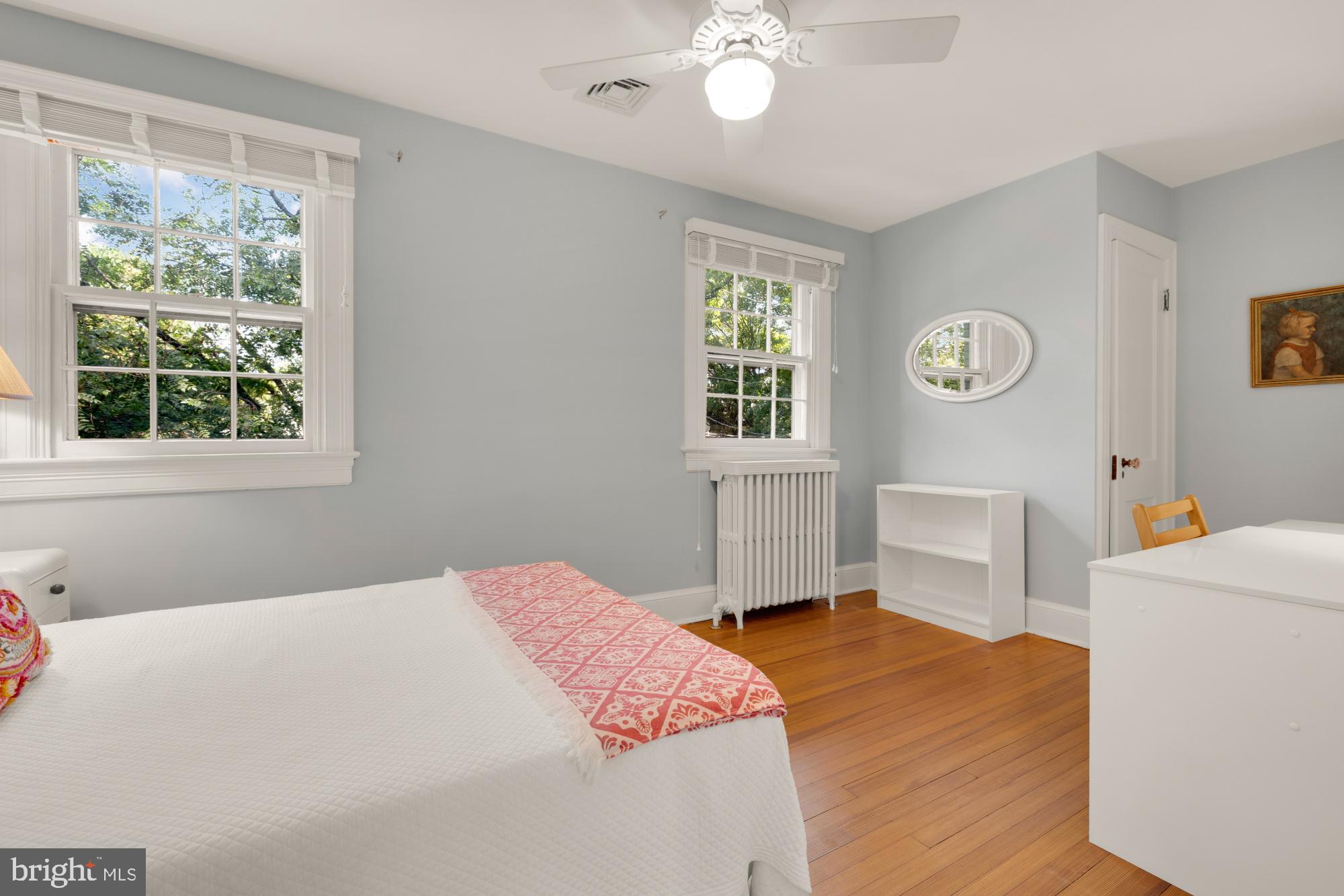 3514 Shepherd Street Chevy Chase, MD 20815 - Photo 25 of 42 a bedroom with a bed dresser and a window