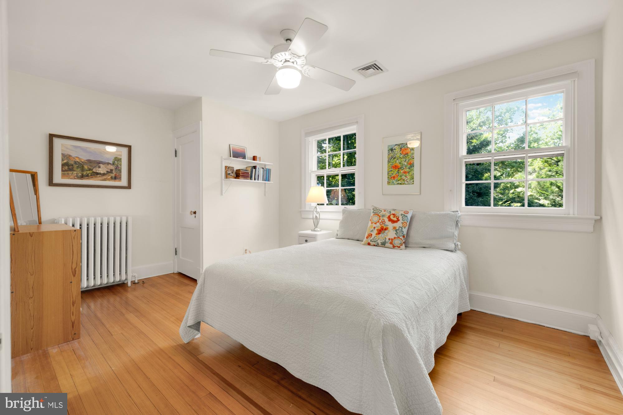 3514 Shepherd Street Chevy Chase, MD 20815 - Photo 27 of 42 a bedroom with a large bed and a window