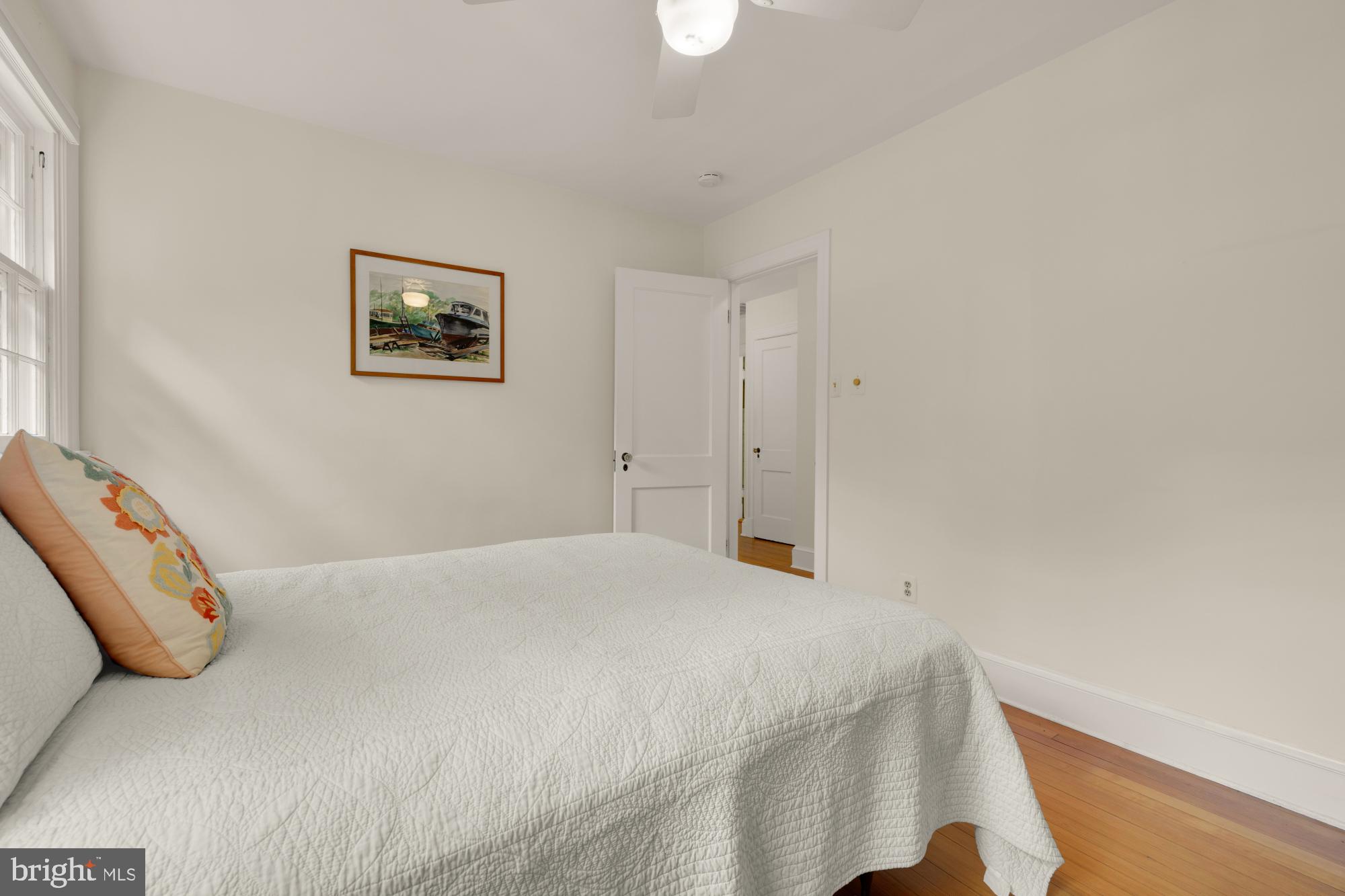 3514 Shepherd Street Chevy Chase, MD 20815 - Photo 28 of 42 a bedroom with a bed and a couch